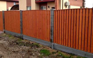 Забор из планкена лиственницы доски и штакетника